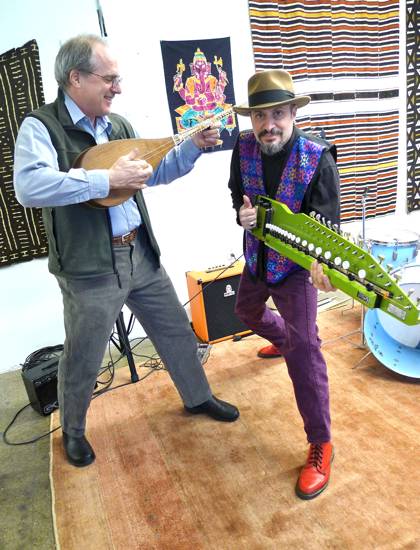 From left: Jeff Greene plays a roya benju from India, while John Kruth plays a dutar from Uzbekistan