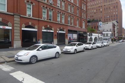 Placard parking priuses on W Broadway