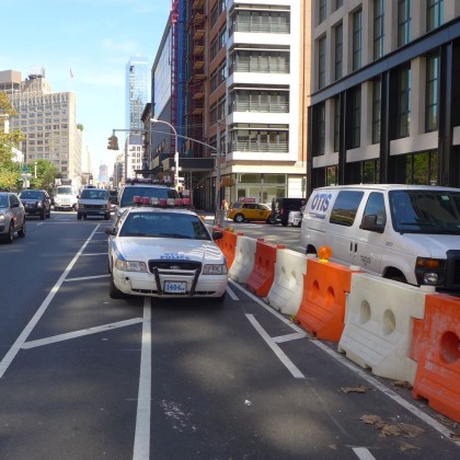 NYPD 1404 parking in bike lane