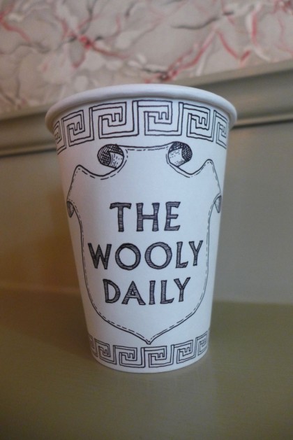 The Wooly Daily front of cup