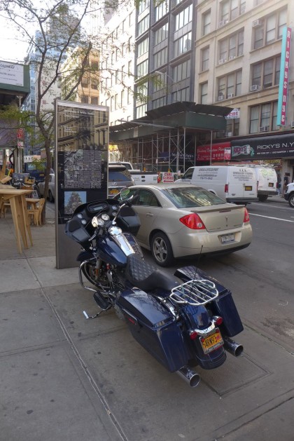 Harley Davidson of NYC parked on Broadway sidewalk