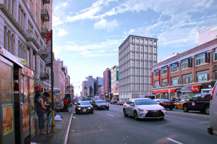 NEW YORK CITY: The Sidewalks Of Canal Street And Broadway Are